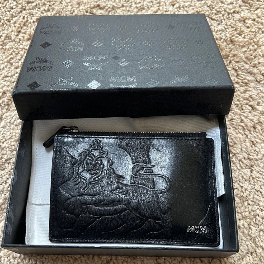 MCM men's lion embossed black with blue and grey mini zipped coin card holder